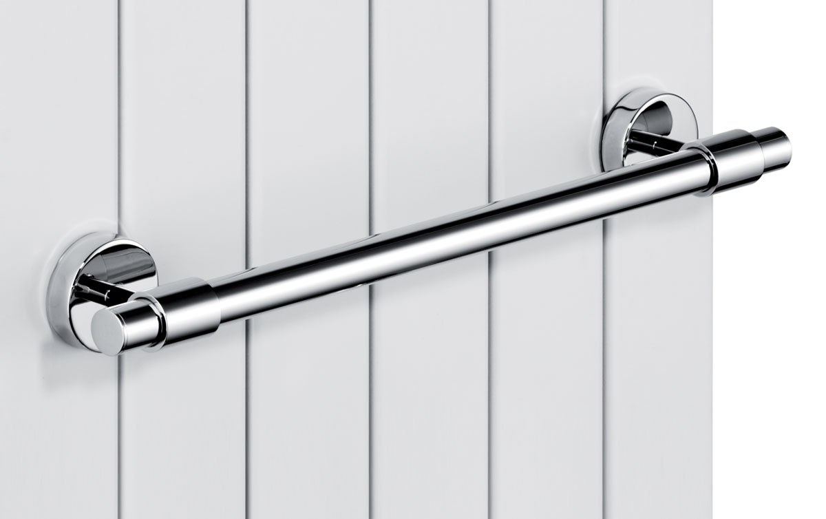 Towel rail with magnetic attachment for radiators